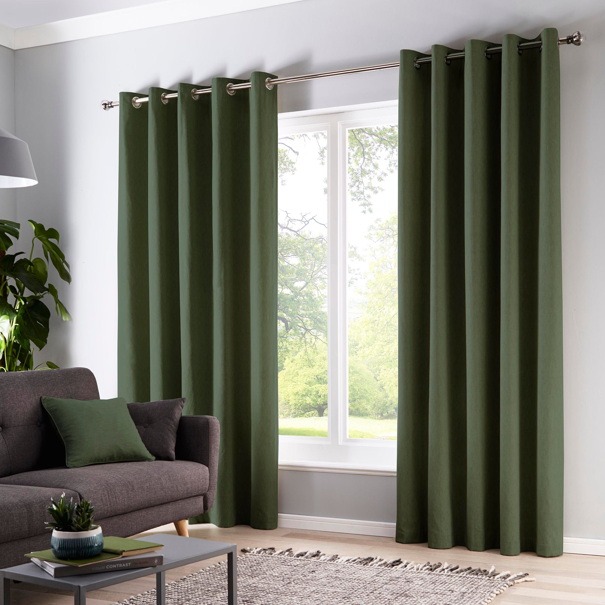 Pair of Eyelet Curtains Cannes by Fusion in Bottle Green