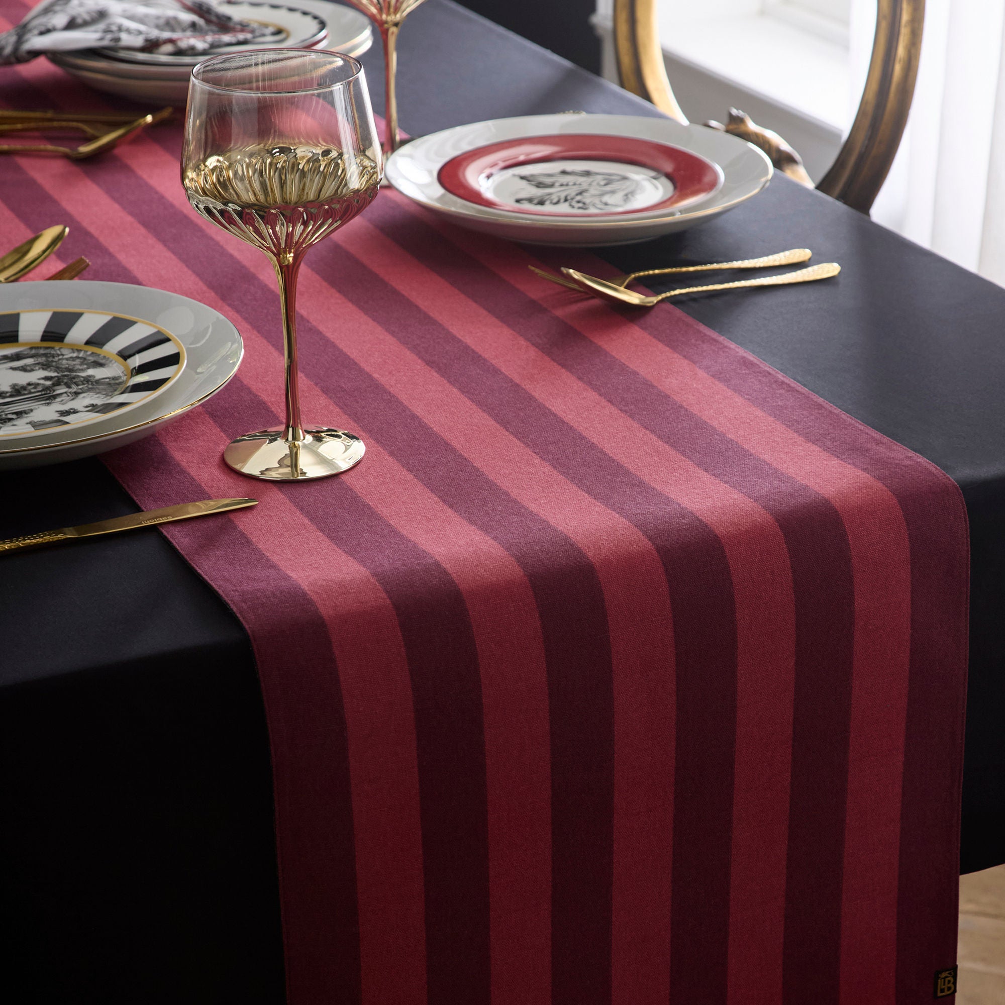 Table Runner Festivo by Laurence Llewelyn-Bowen in Red