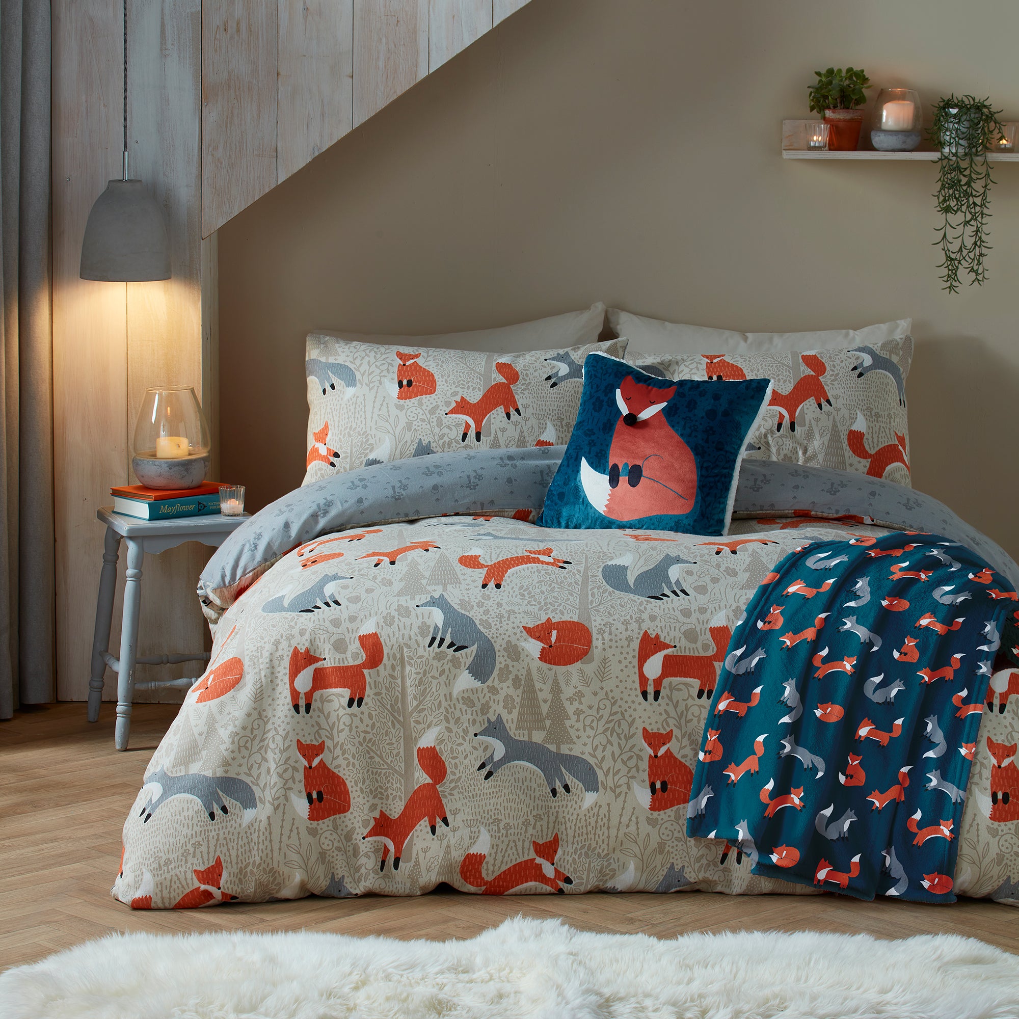 Filled Cushion Foraging Fox by Fusion Snug in Teal
