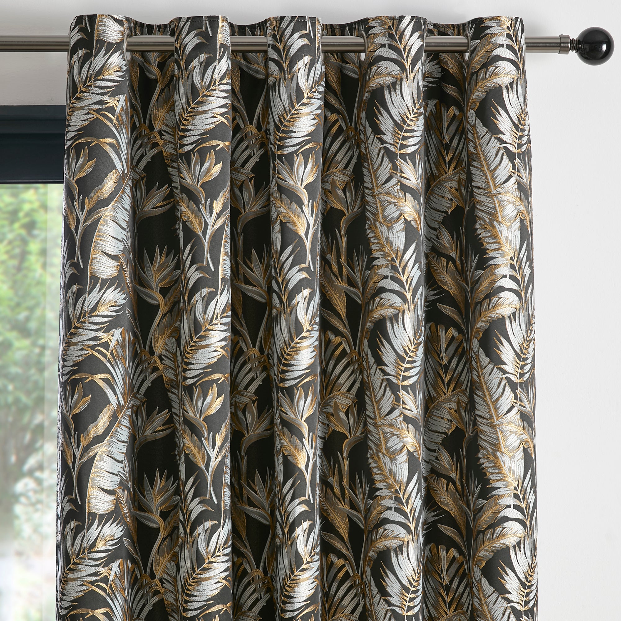 Pair of Eyelet Curtains Paradise Palm by Laurence Llewelyn-Bowen in Black