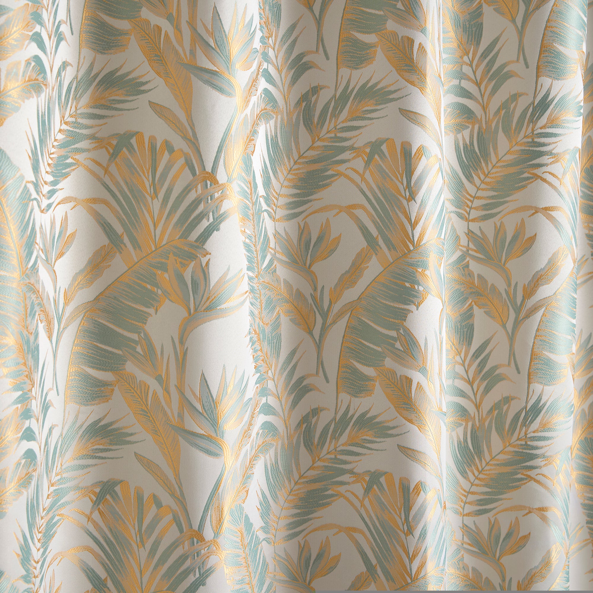 Pair of Eyelet Curtains Paradise Palm by Laurence Llewelyn-Bowen in Duck Egg