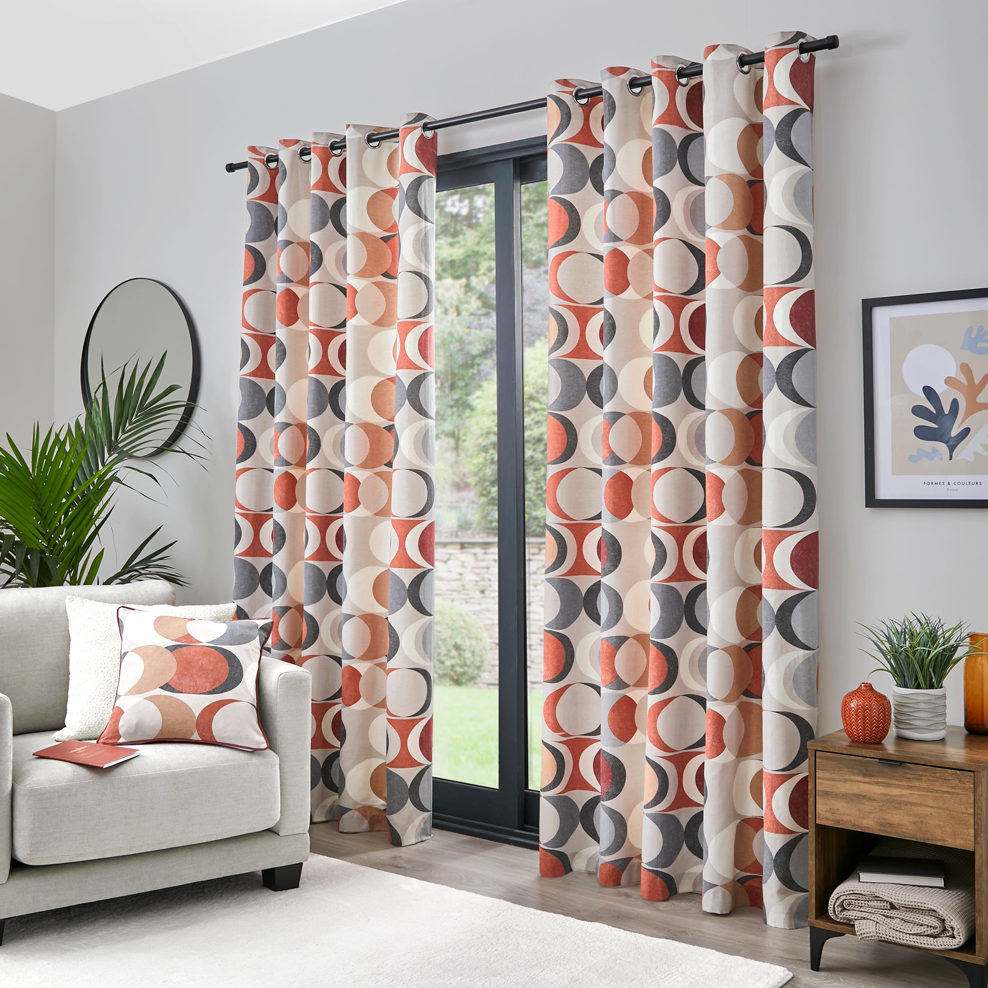 Pair of Eyelet Curtains Sander by Fusion in Spice