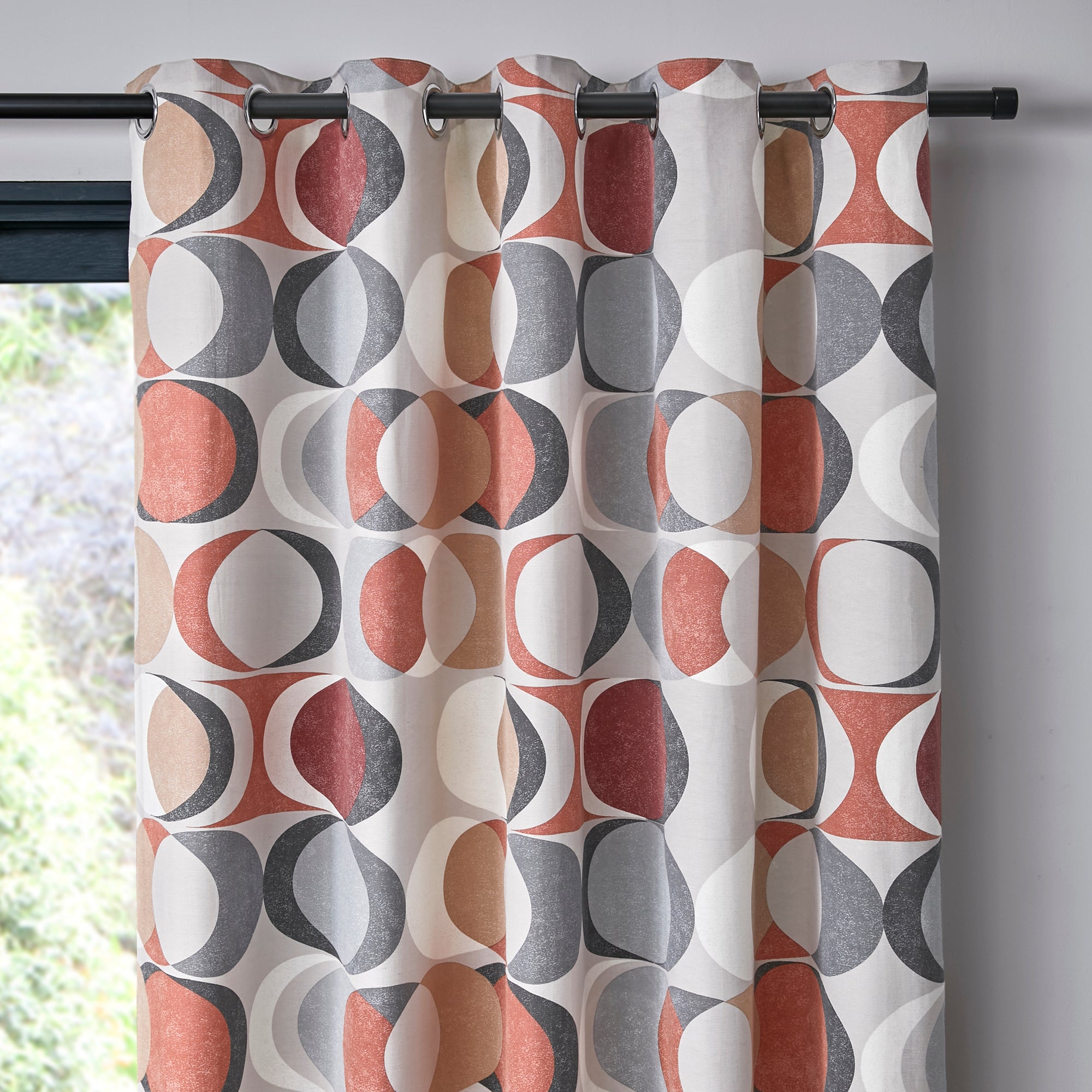 Pair of Eyelet Curtains Sander by Fusion in Spice