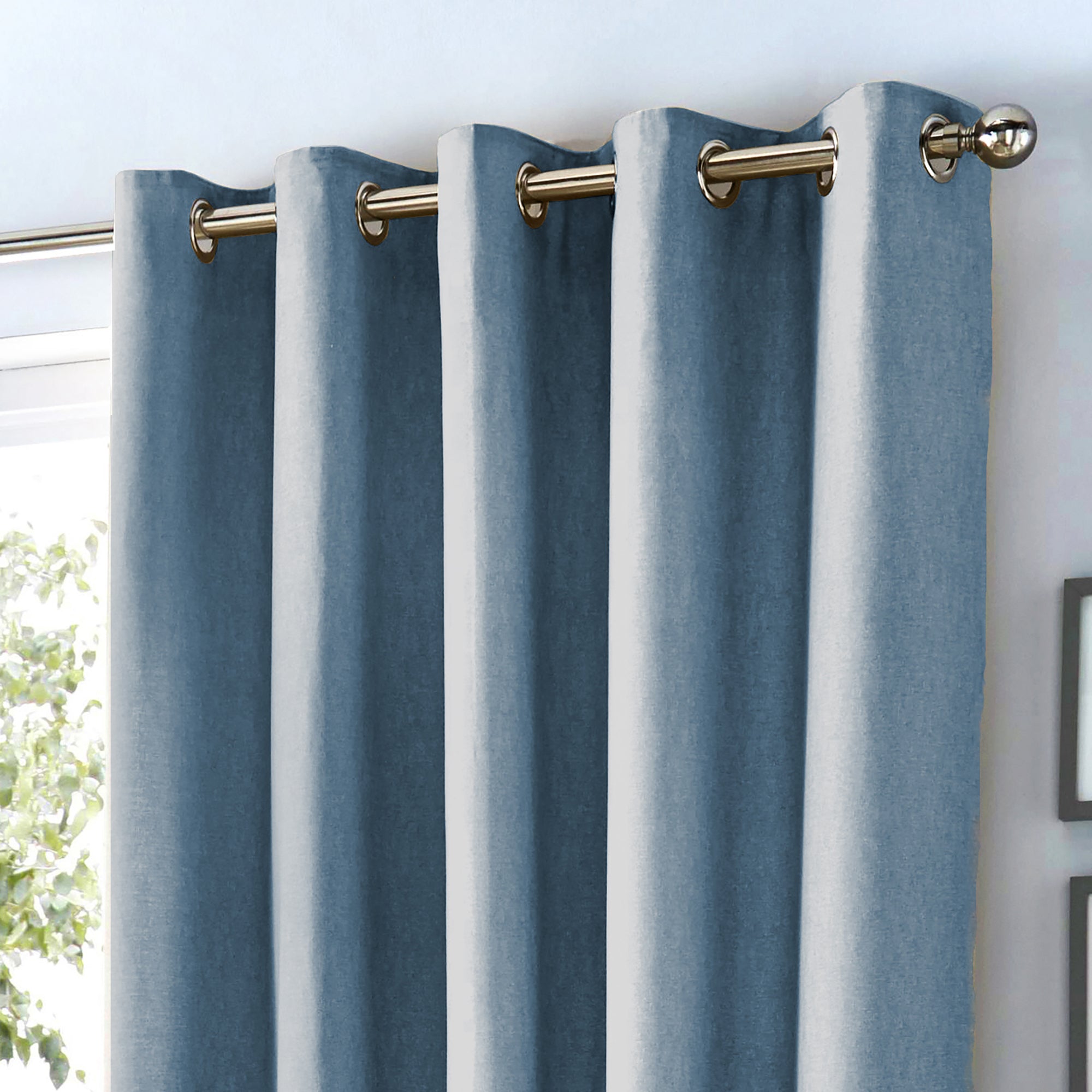 Pair of Eyelet Curtains Sorbonne by Fusion in Light Blue