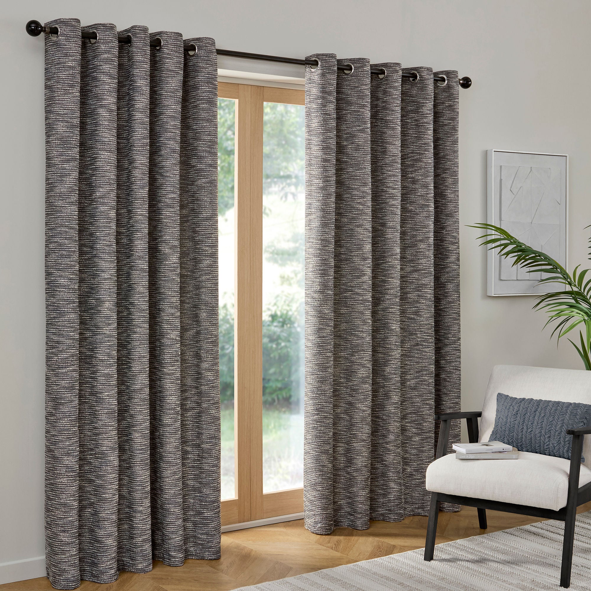Pair of Eyelet Curtains Talon by Curtina in Blue