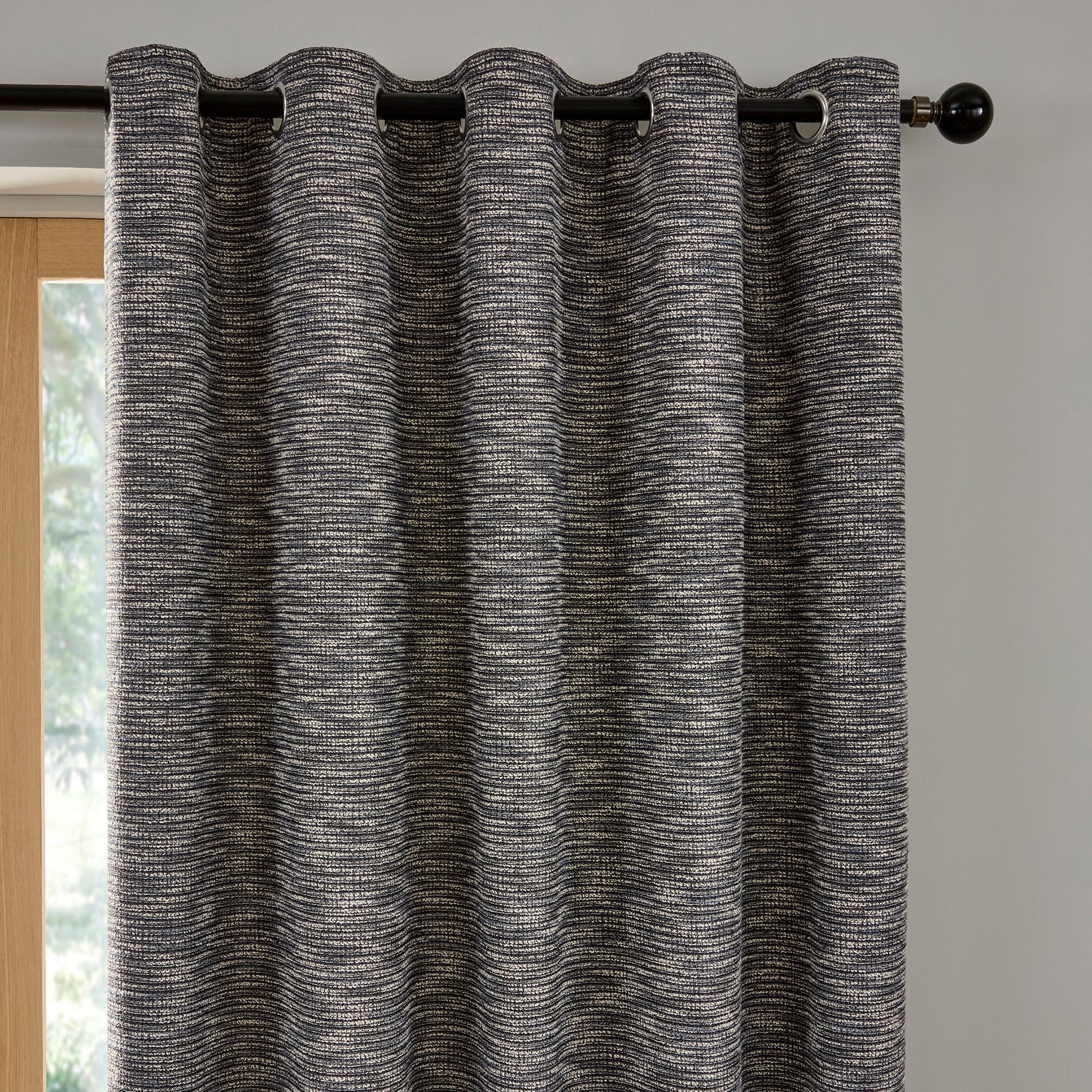 Pair of Eyelet Curtains Talon by Curtina in Blue