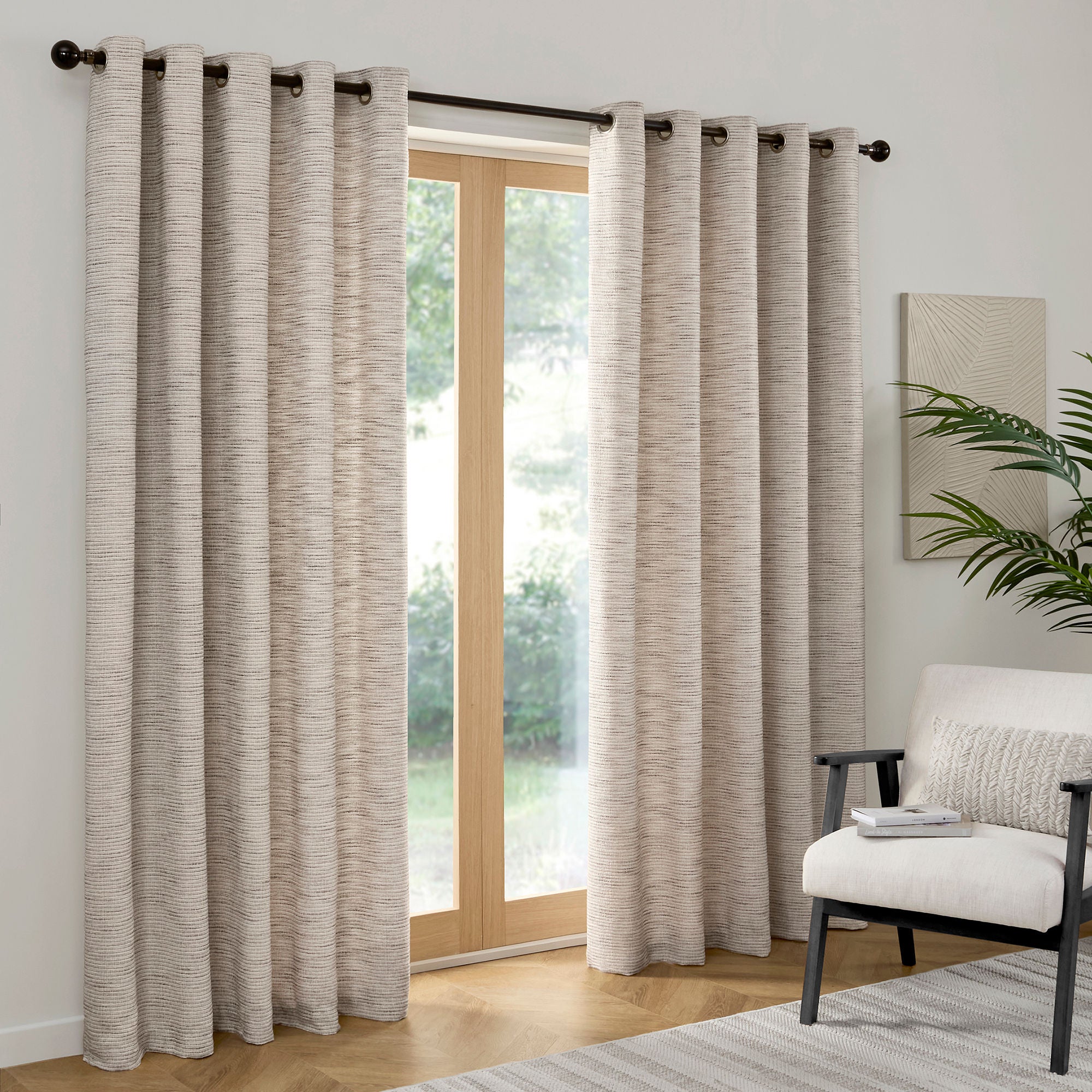 Pair of Eyelet Curtains Talon by Curtina in Grey