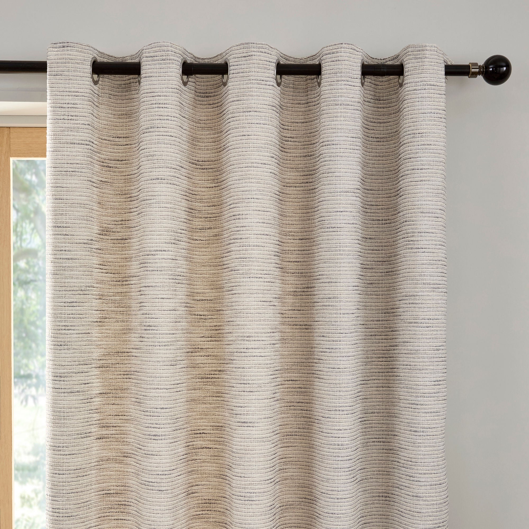 Pair of Eyelet Curtains Talon by Curtina in Grey