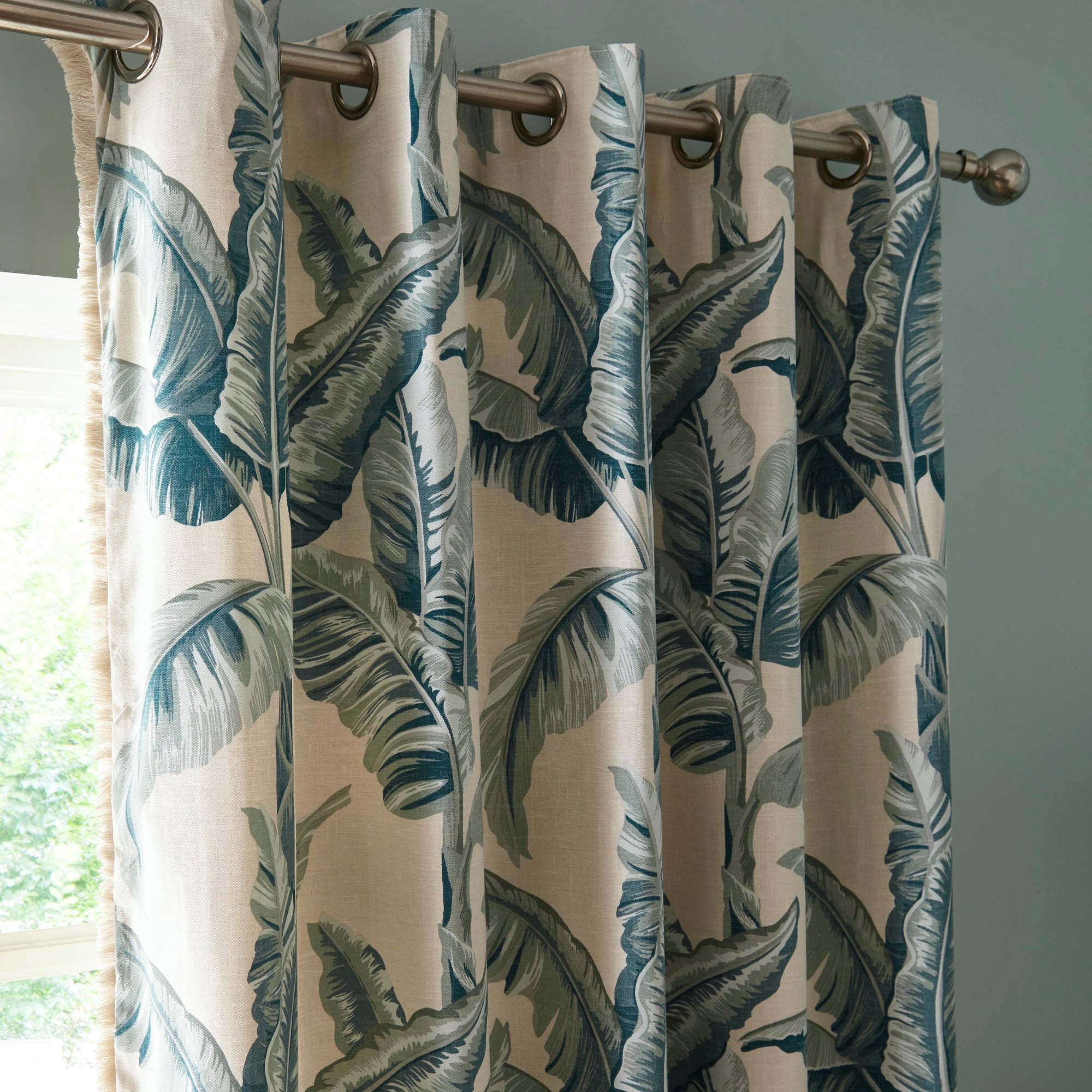 Pair of Eyelet Curtains Cadiz by Fusion in Teal