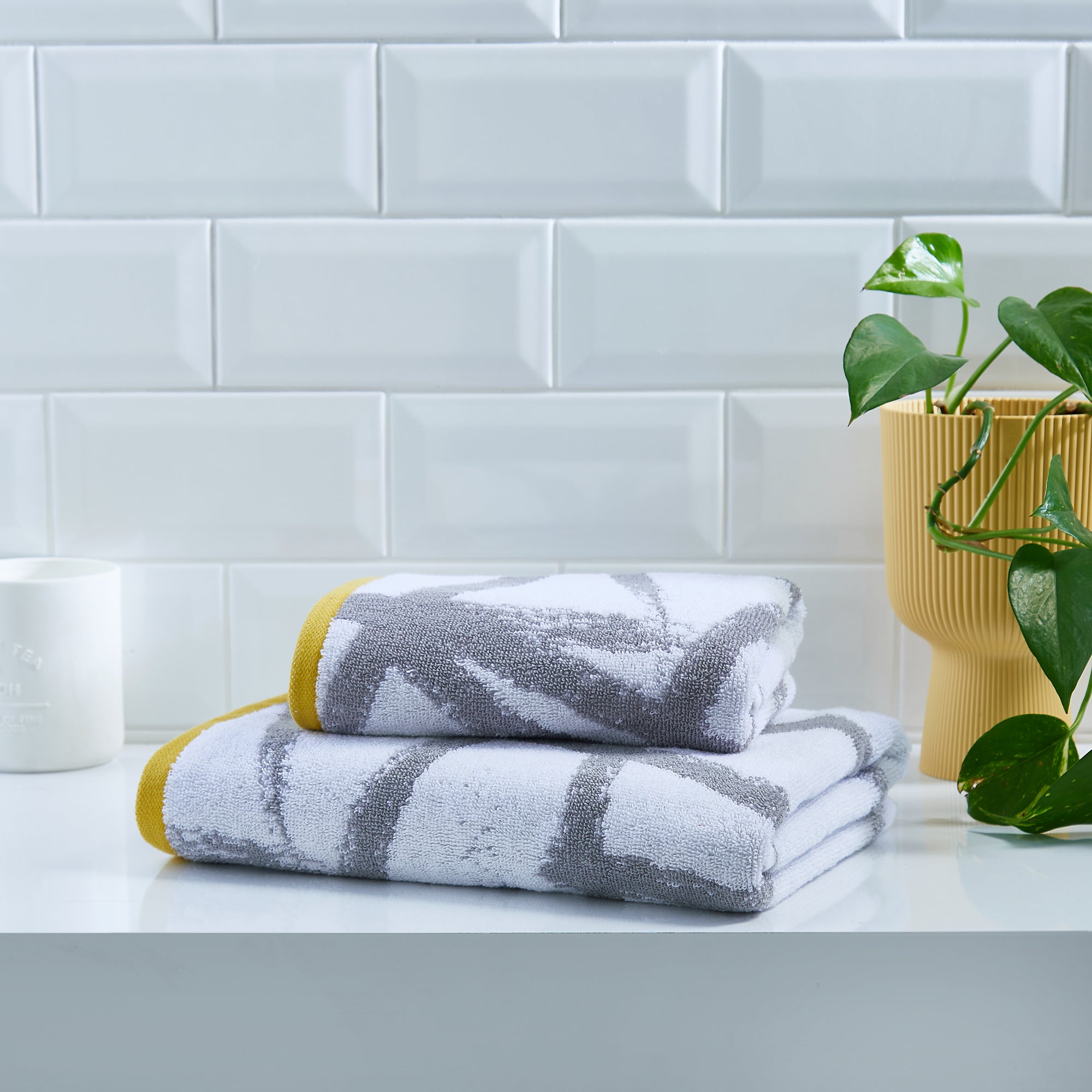 Leda Hand and Bath Towels by Fusion Bathroom in Grey/Ochre