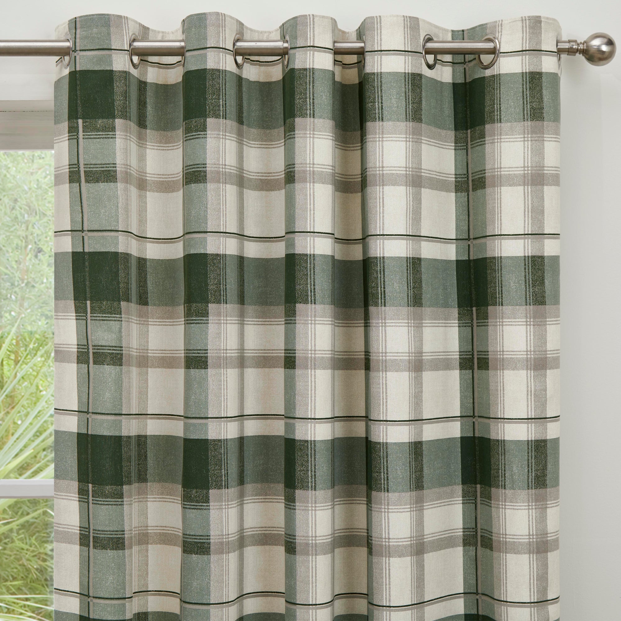 Pair of Eyelet Curtains Balmoral Check by Fusion in Bottle Green