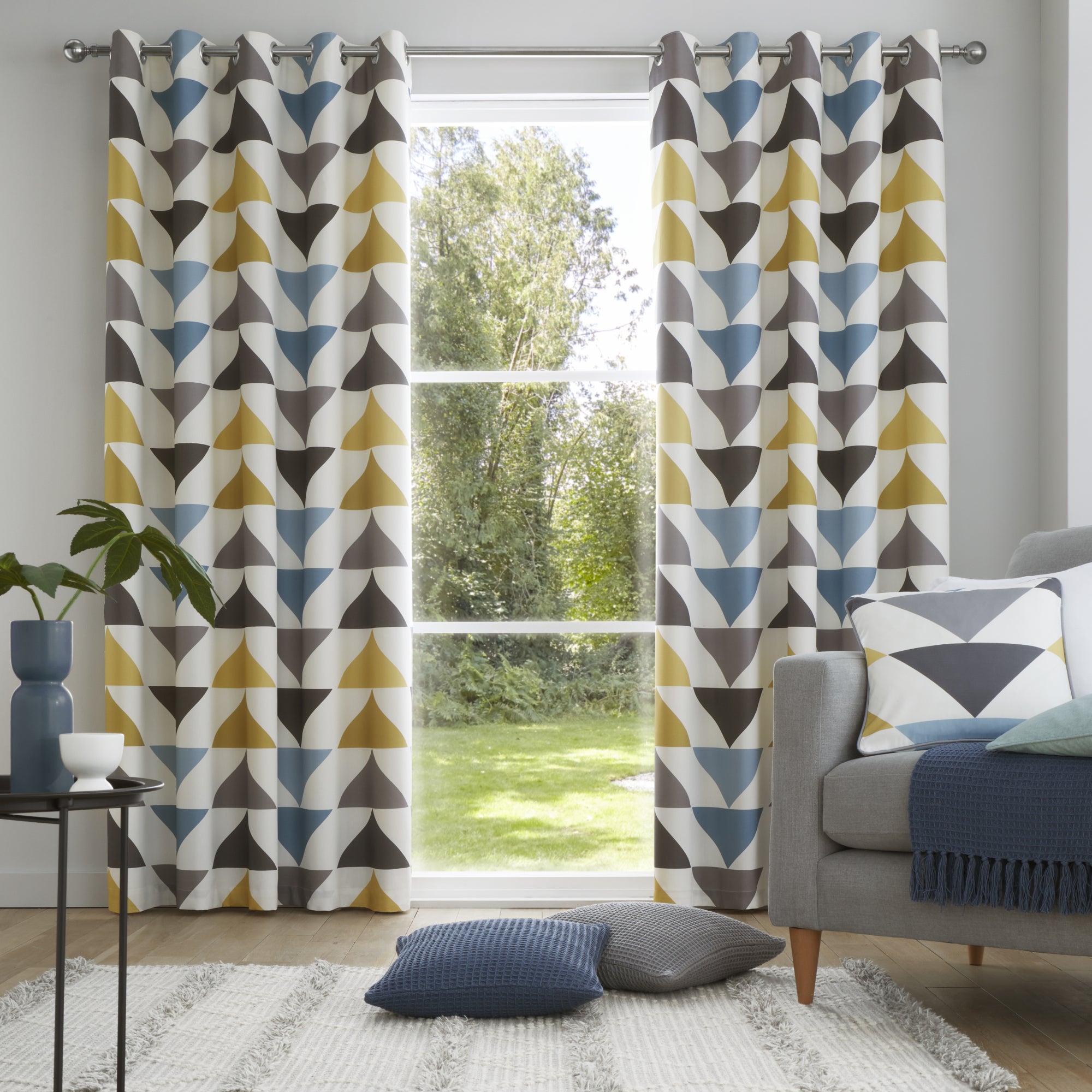 Pair of Eyelet Curtains Brodrick by Fusion in Blue/Ochre