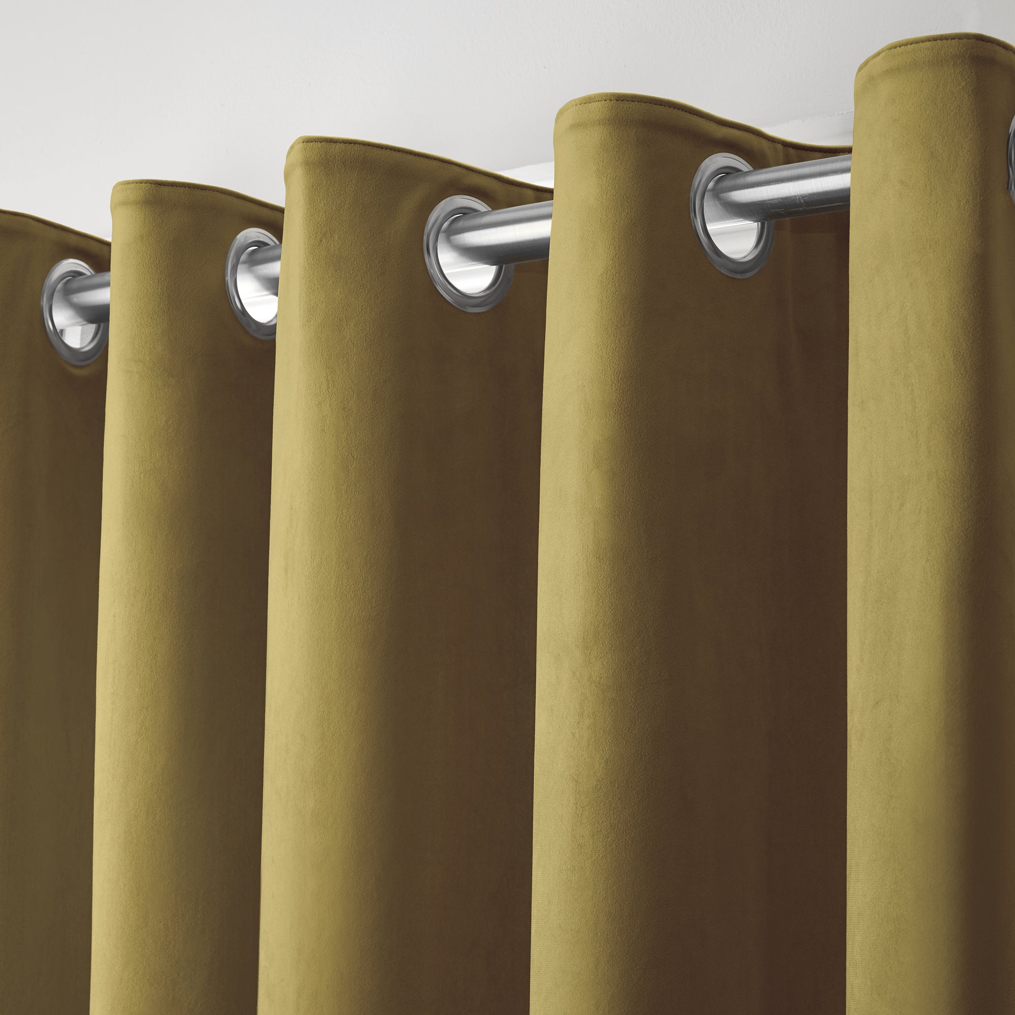 Montrose - Velvet Blackout Pair of Eyelet Curtains in Ochre - by Laurence Llewelyn-Bowen
