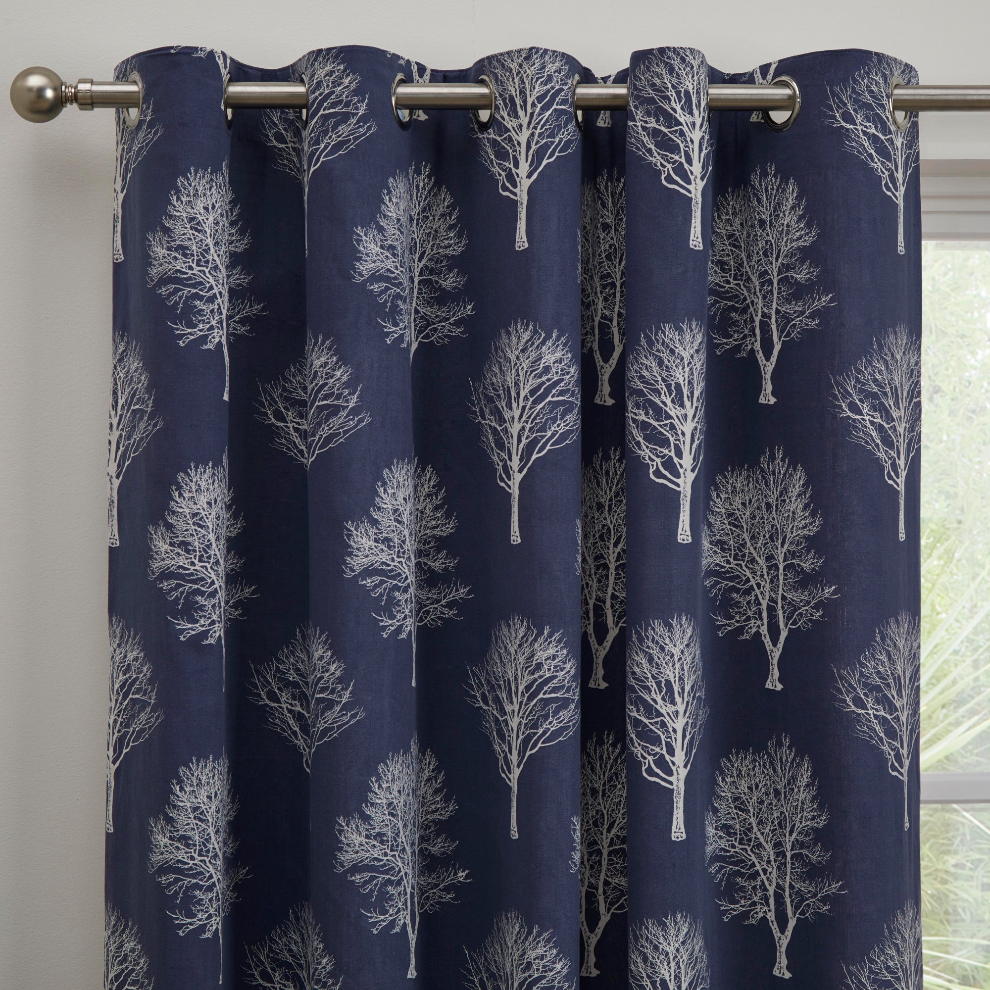 Pair of Eyelet Curtains Woodland Trees by Fusion in Navy
